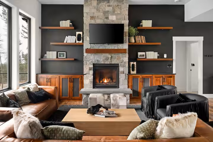 The Evergreen great room with stone fireplace and seating for time together